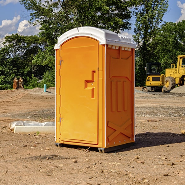 how often are the portable restrooms cleaned and serviced during a rental period in Macon MS